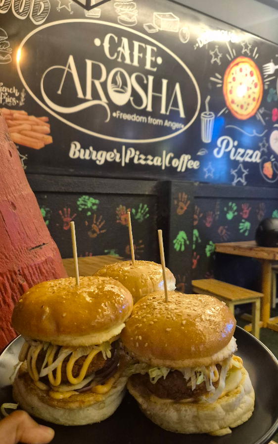 Cafe Arosha burgers with the cozy ambience in background